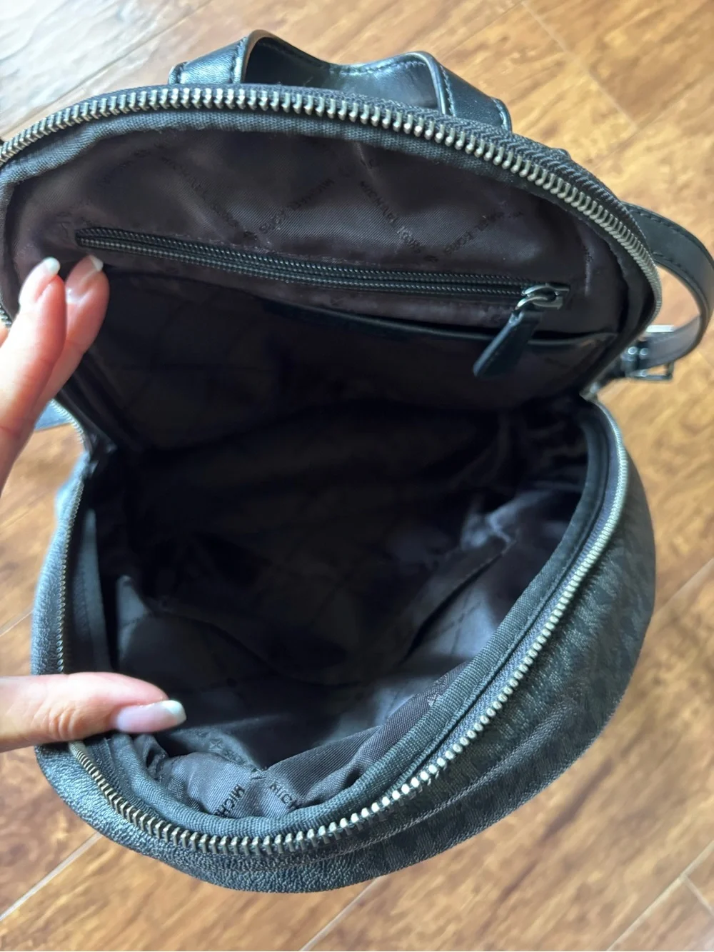 Michael Kors Black Quilted Interior Backpack Purse